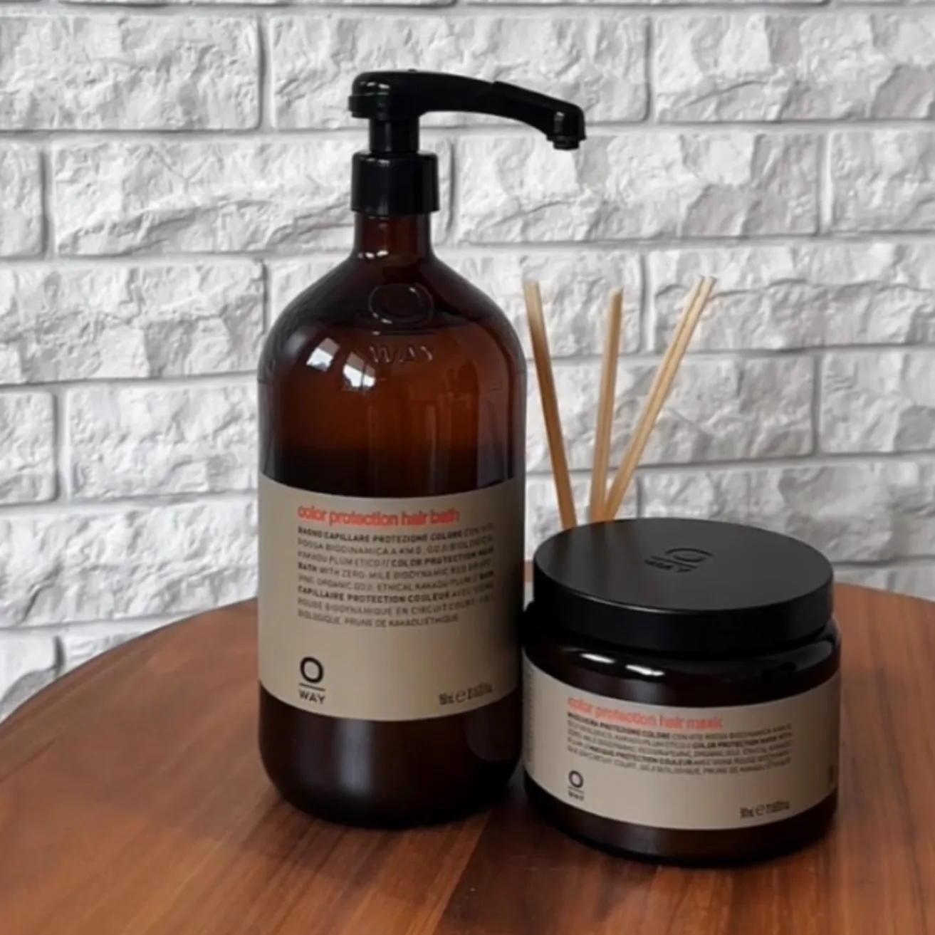 Oway professional scalp and hair products on the Sanctuary product table